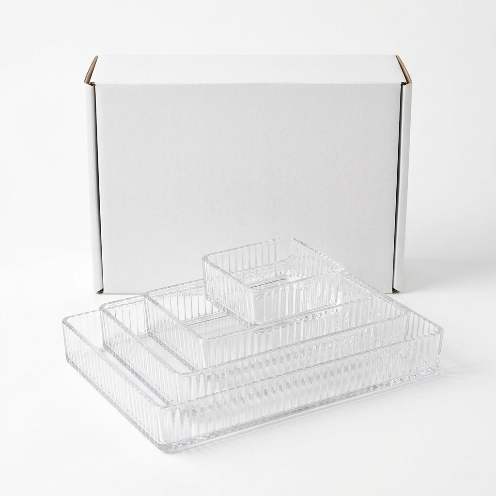 Plain unbranded white box with four nested clear acrylic organizer bins in front